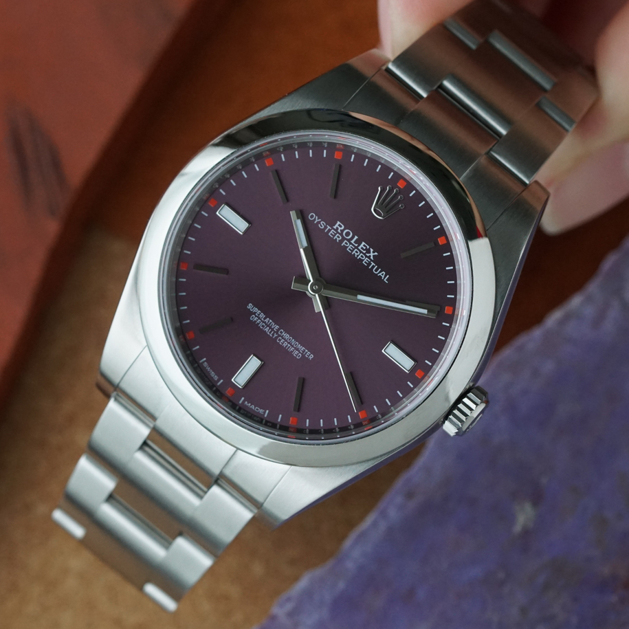 Rolex Oyster Perpetual Red Grape Dial Ref 114300 Steel Automatic