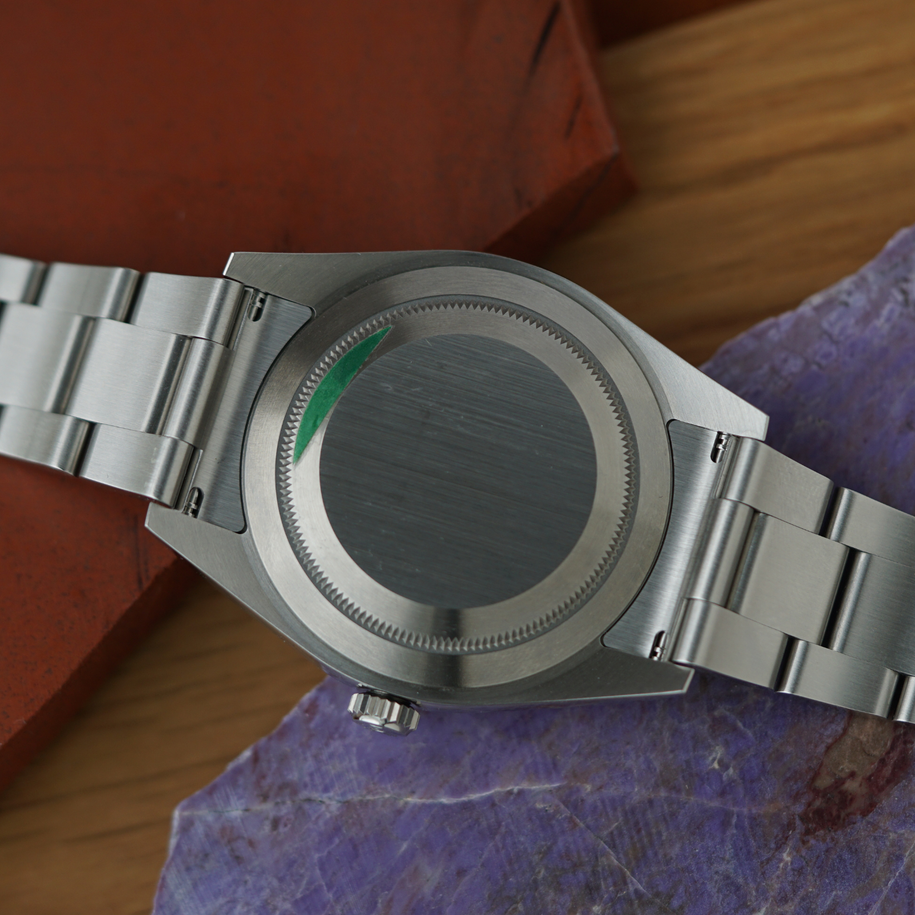 Rolex Oyster Perpetual Red Grape Dial Ref 114300 Steel Automatic