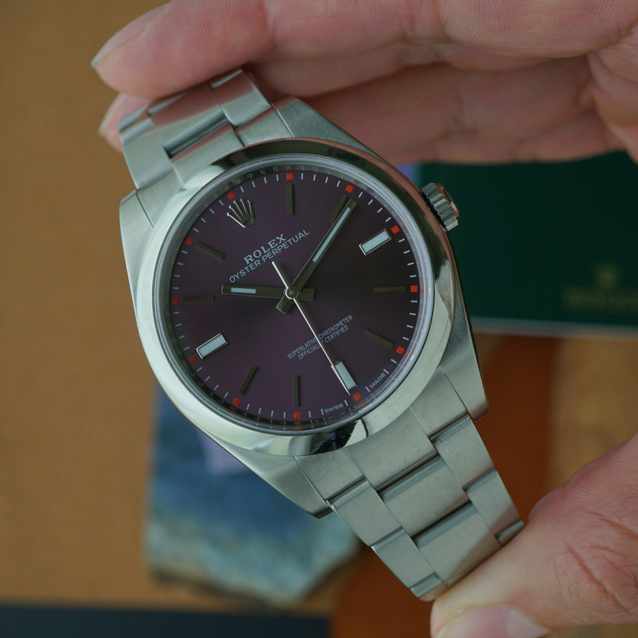 Rolex Oyster Perpetual Red Grape Dial Ref 114300 Steel Automatic