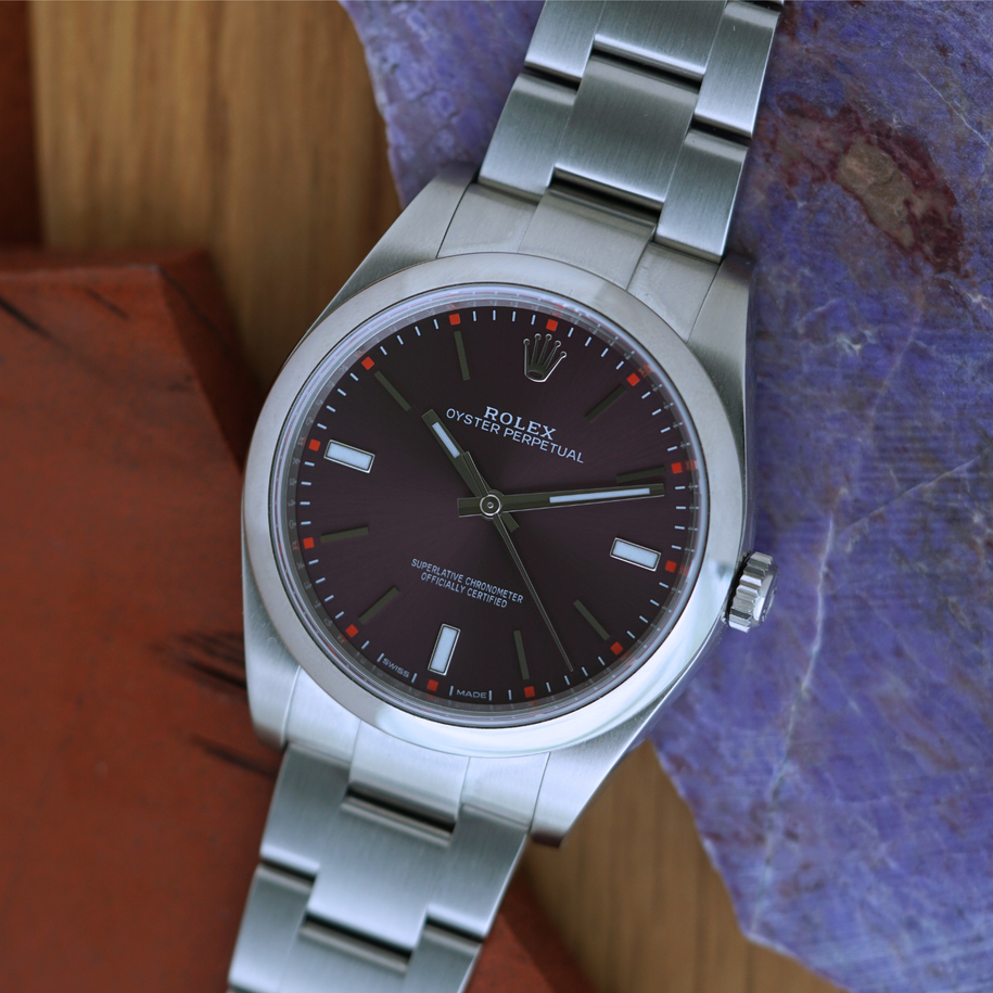Rolex Oyster Perpetual Red Grape Dial Ref 114300 Steel Automatic