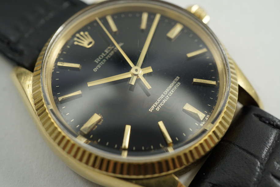 Rolex 1005 Oyster Perpetual 18k stunning black gilt dial c. 1963 pre-owned for sale houston fabsuisse