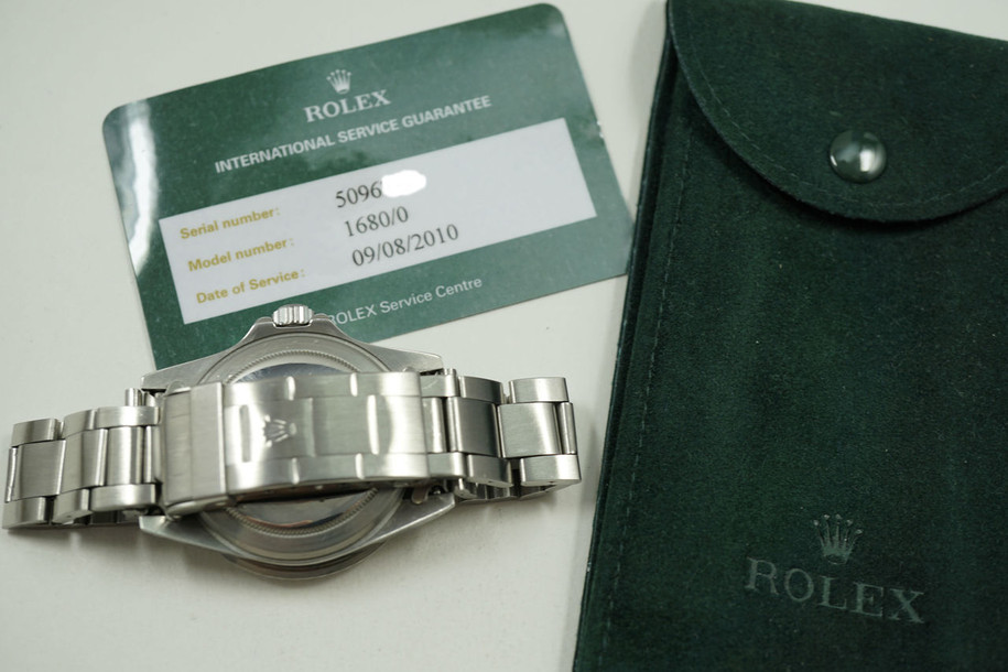 ROLEX 1680 SUBMARINER STAINLESS STEEL. SERVICE CARD FROM 9/2010. MINT. 