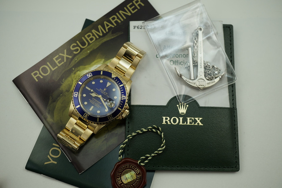 ROLEX 16618 SUBMARINER 18K SOLID GOLD BOX,PAPERS, BOOKS DATES 2003  PRE-OWNED FOR SALE HOUSTON FABSUISSE
