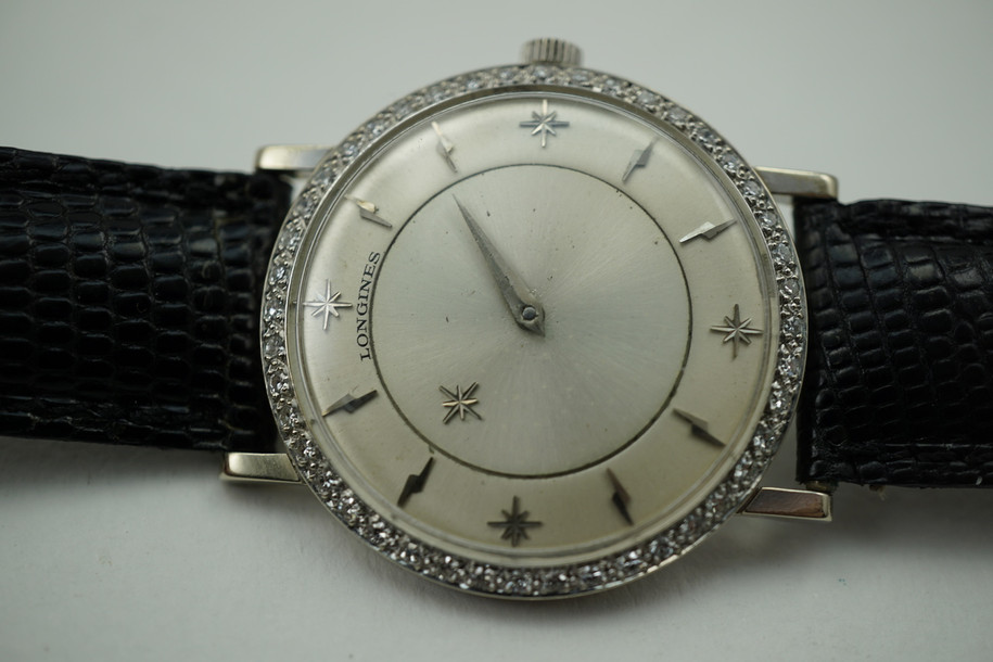 Longines Mystery Dial 18k white bolts & stars w/ diamond bezel c. 1958 for sale houston fabsuisse