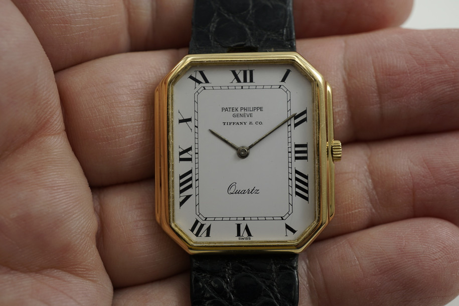 ON HOLD: Patek Philippe 3853 retailed by Tiffany & Co. modern 18k dates 1980's quartz pre owned for sale houston fabsuisse