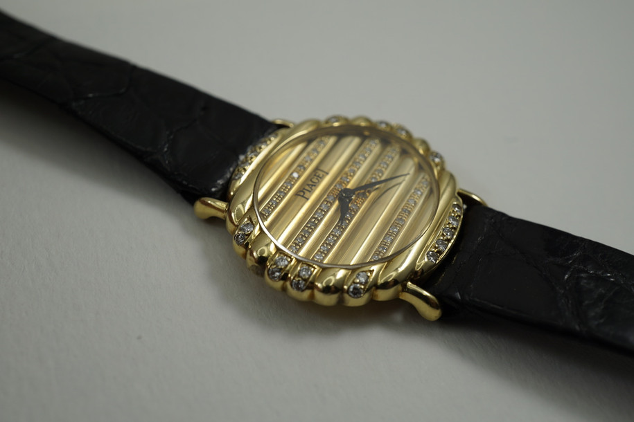 Piaget 98172 Polo Factory diamonds 18k yellow gold c. 1980's pre owned for sale houston fabsuisse