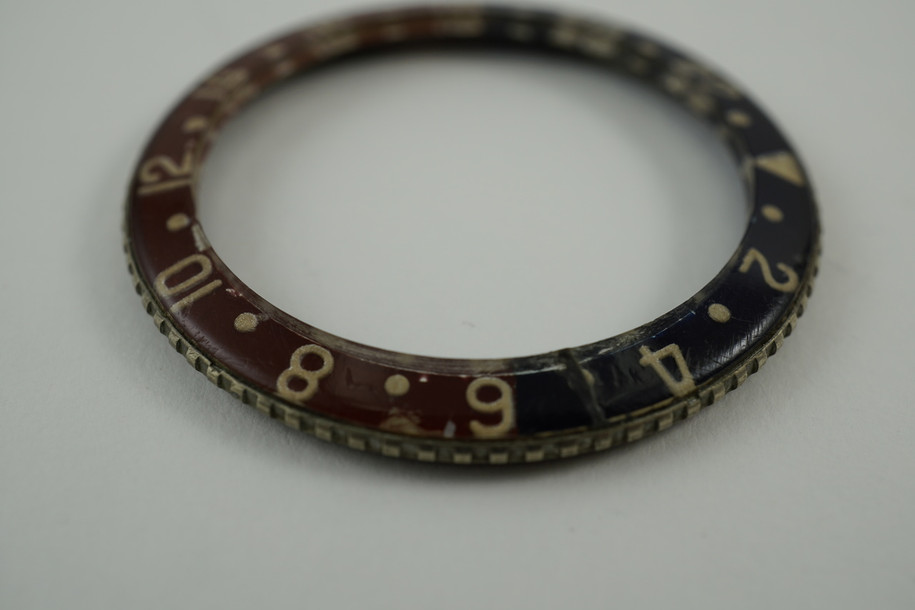 Rolex 6542 Bakelite dark blue & maroon bezel insert original rare dates 1950's