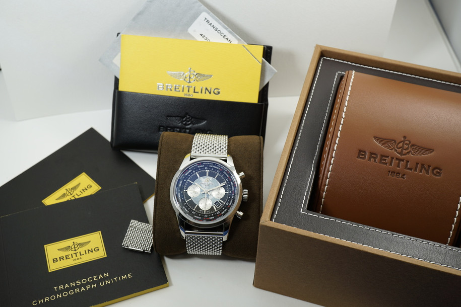 Breitling AB0510 Transocean Unitime Chronograph World Time box & papers for sale houston fabsuisse