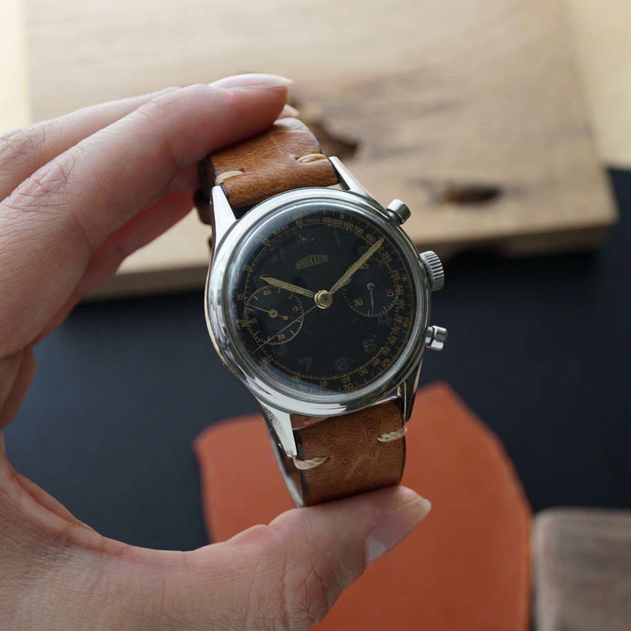 Angelus Chronograph vintage black gilt dial cal. 215 stainless steel 1950s  fabsuisse
