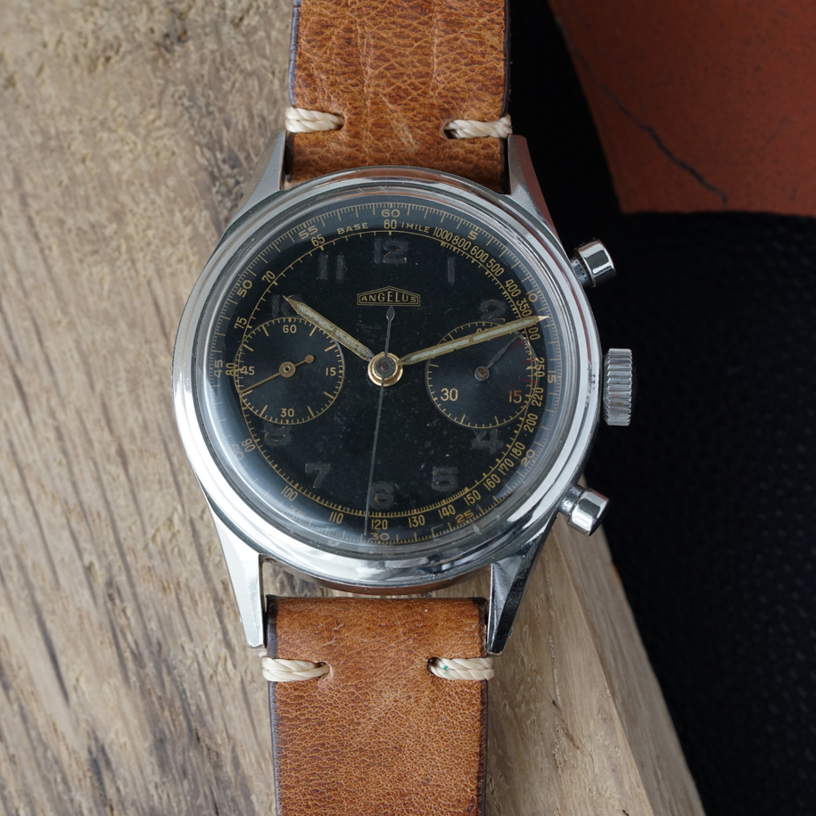 Angelus Chronograph vintage black gilt dial cal. 215 stainless steel 1950s  fabsuisse