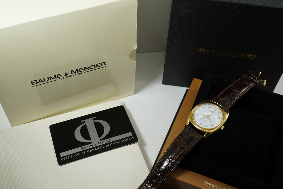 Baume & Mercier MVO 45176 Milleis Solid 18k yellow gold automatic w/ date box & books 1990's pre owned for sale houston fabsuisse