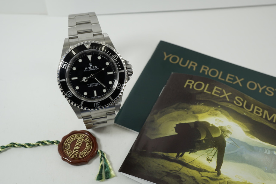 Rolex 14060 M 2-Line Submariner full halogram "Z series" bookks & tags 2006-2007 modern highly jeweled automatic original watch pre owned for sale houston fabsuisse