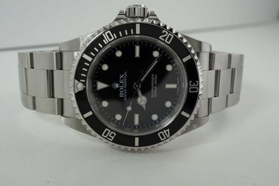 Rolex 14060 M 2-Line Submariner full halogram "Z series" bookks & tags 2006-2007 modern highly jeweled automatic original watch pre owned for sale houston fabsuisse