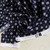 140gsm blue-black motif half crepe, by metre