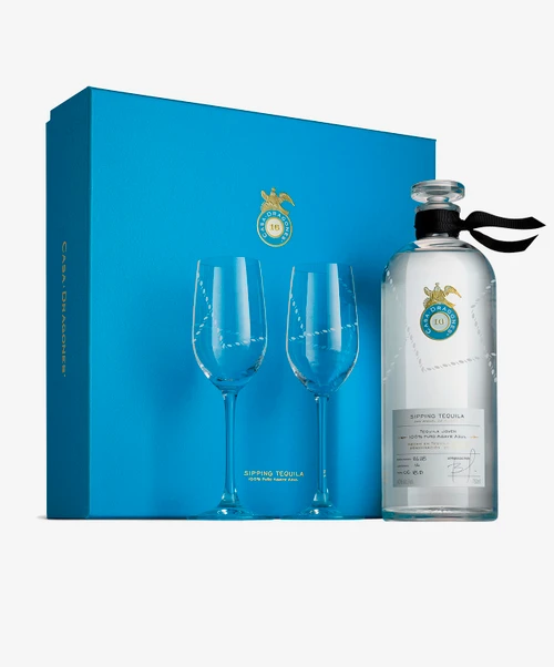 Casa Dragones Joven gift set that includes two Riedel crystal tequila glasses, delicately engraved with the same stunning motif.