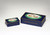 Two blue tin boxes of chocolates. Two blue tin boxes of chocolates.