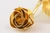 Detail of rose petals from gold rose brooch.