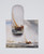 Eyeglass case over the flat dust cloth, which features Turner's painting: Antwerp: Van Goyen Looking Out for a Subject.