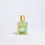 Fragrance bottle called Heliotrope Blanc featuring a mint green label.