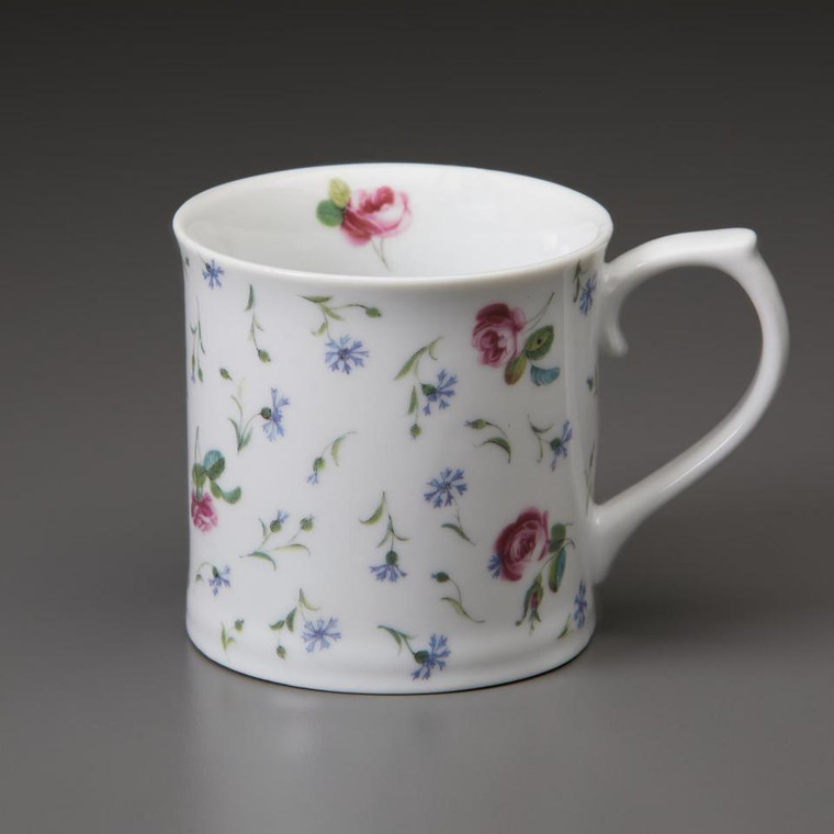 floral designs on a white porcelain mug