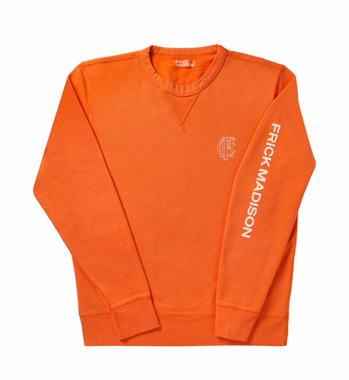 long sleeved orange sweatshirt with frick madison written across the left sleeve