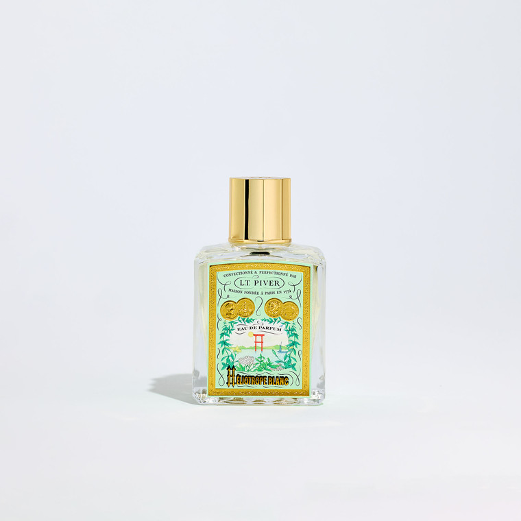 Fragrance bottle called Heliotrope Blanc featuring a mint green label.