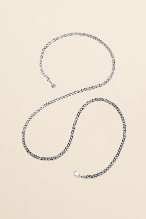 Silver-tone chain strap arranged on a cream background, shown in full to highlight its length and clasp details.