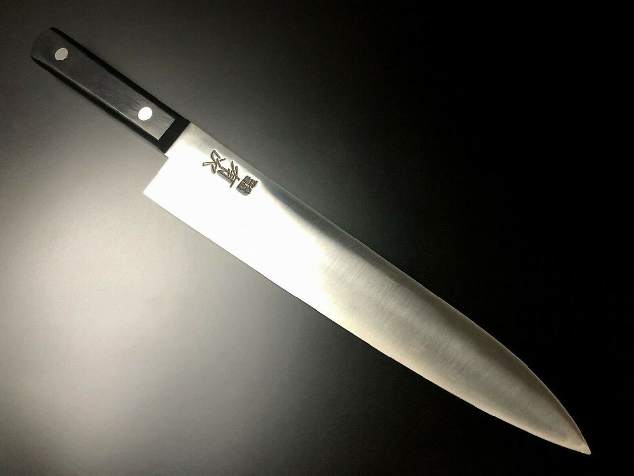 Global G-2 chef's knife with 200 mm long blade. One of the