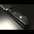 Close-up of Aritsugu Gyuto 270mm Japanese chef knife black handle
