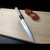 Authentic Tsukiji Aritsugu 140mm (5.5") Wa-Petty, lightweight 40g AUS-10 steel utility knife with magnolia handle.