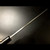 Spine view of a Tsukiji Aritsugu 150mm Blue Steel No. 2 usuba knife, showing the blade thickness and taper toward the tip