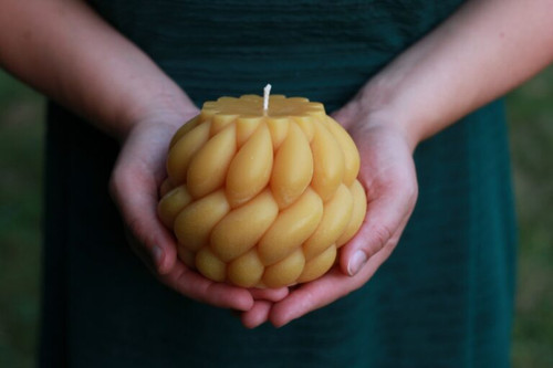 Available for a limited time! Coziness is manifested in this chunky, adorable candle! Beeswax is an all-natural gift from the hive that burns brighter than any other wax, emits air-purifying negative ions, and diffuses the sweet scent of honey. Burning tips: Trim your wick to 1/4″ before lighting again. Keep away from drafts, vents, open windows, small children, pets, and flammable objects that could catch fire. Never leave your candle unattended. Burn candle until the edge is melting to prevent tunnelling. Stop burning your candle when there’s about 1/2″ of beeswax left to prevent overheating your vessel. (But don’t throw away your leftover…