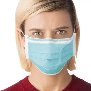 Worker wearing general purpose disposable mask in industrial environment