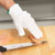 Butcher wearing D Flex stainless steel Dyneema cut resistant gloves in meat processing