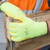 Worker wearing high visibility ANSI A4 cut resistant gloves for material handling