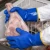 Worker wearing PVC insulated gloves while handling ice and frozen goods