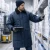 Refrigerated Warehouse Worker Wearing Knee Length Freezer Jaket