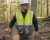 Splash-resistant disposable coverall with hood and boots for industrial maintenance, remediation, sanitation, and light liquid splash protection. Case of 25.