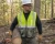 Splash-resistant disposable coverall with hood and boots for industrial maintenance, remediation, sanitation, and light liquid splash protection. Case of 25.