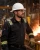 Industrial worker wearing a white MSA Skullgard heat-resistant hard hat with safety glasses and FR workwear in a foundry environment