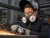 female welder wearing MSA P95 Flexi-Filters while grinding metal in an industrial workshop