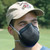 Worker wearing Moldex M2600 Black N95 particulate respirator on construction site