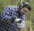Worker wearing 3M Peltor X4A hearing protection earmuffs