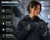 Woman wearing WindBlocker cold weather freezer gloves while using a touchscreen tablet in a cold storage warehouse