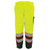 Worker wearing breathable high-visibility yellow safety pants with waterproof bottom