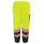 Worker wearing breathable high-visibility yellow safety pants with waterproof bottom