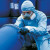 Breathable disposable PPE suit with elastic cuffs for secure workplace protection