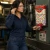 Industrial worker retrieving Moldex SparkPlugs foam earplugs from a wall-mounted PlugStation dispenser before entering a high-noise work area.