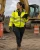 Female Worker Wearing Hi Vis Winter Rain Jacket