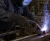 Welder wearing black leather welding gloves while welding steel tubing in fabrication shop